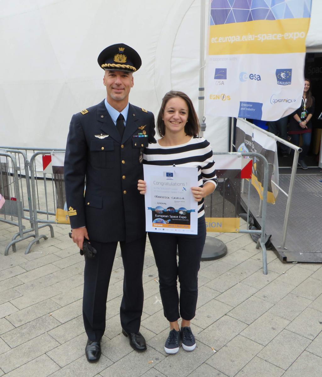 Italian astronaut Luca Parmitano and the 500,000th visitor to the European Space Expo. 