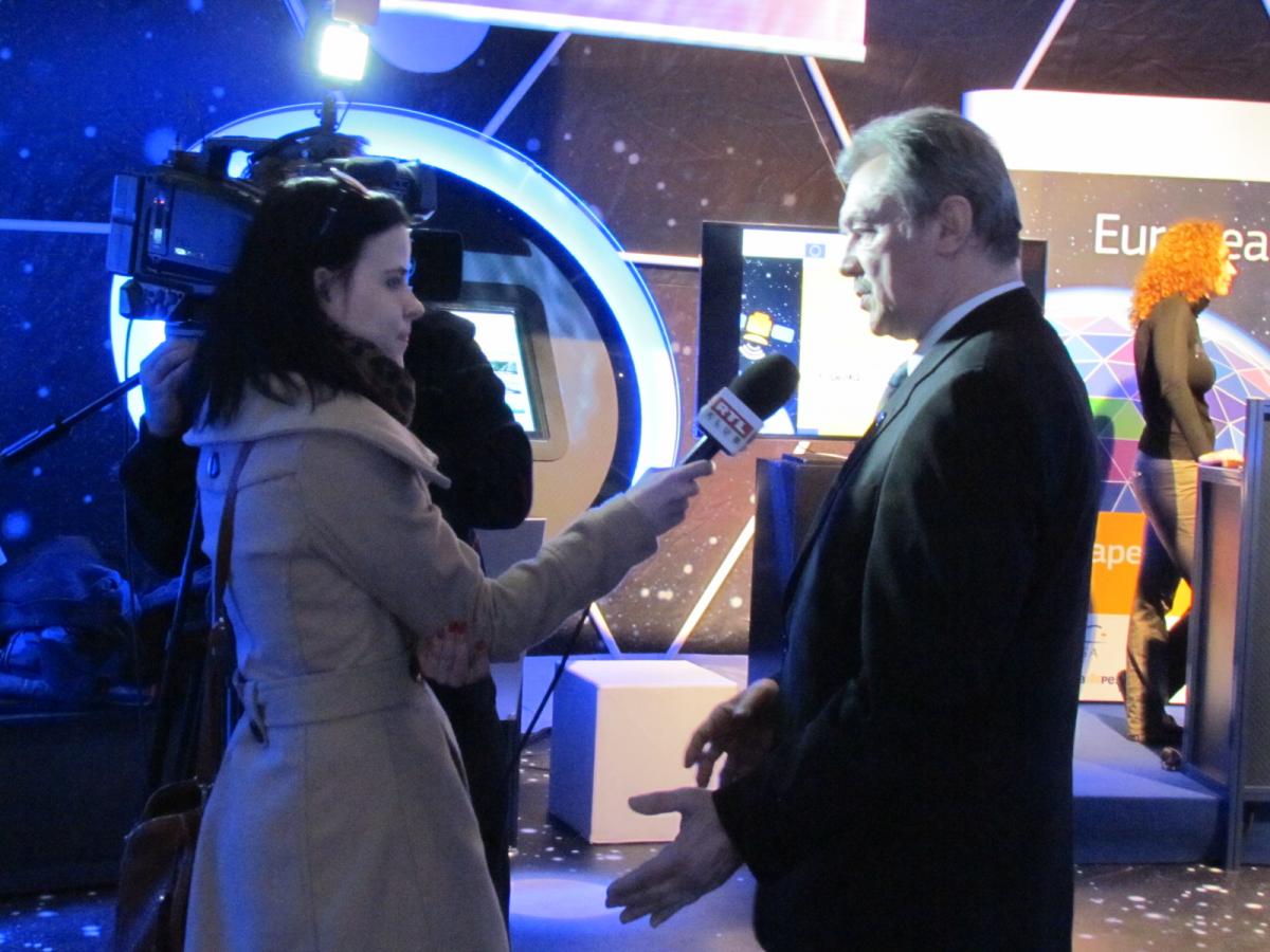 Hungarian cosmonaut Bertalan Farkas is interviewed after the opening ceremony. © Reynolds