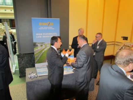Alberto Fernández Wyttenbach (left) discusses RUC with Zoltan Varga of Hungary’s National Toll Payment services at the EGNOS stand.