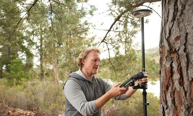 Forestry surveyor at work