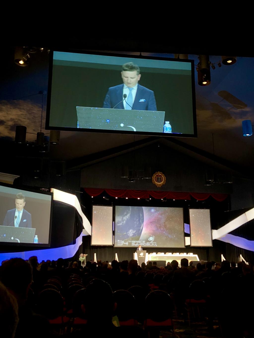 Tomasz Husak delivers his keynote address at the 34th Space Symposium (April 17, 2018 in Colorado Springs, Colorado, U.S.A). 