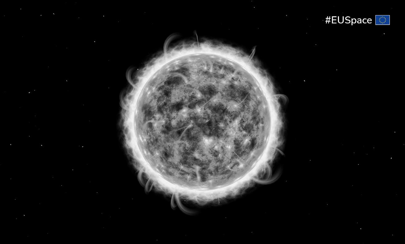 black and white image of the sun producing solar flares