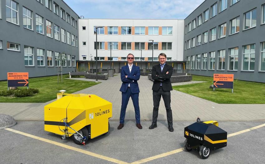 The masterminds of 10Lines, Tarmo Prints and Janno Paas together with their autonomous robots.